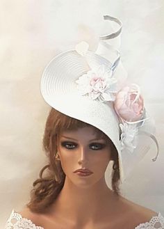 Large White  Hat Fascinator with long Silver edge Crin Swril and  Shade of light CHAMPAGNE PINK Flowers, perfect for Mother of Bride or Goom, Royal Ascot, Kentucky Derby, Weddings Goodwood revival, Christening, Ascot or any special occasion.  This hat can be made with GOLD edge Crinoline Swril on request.  Gorgeous White and  Light shade of pink floral straw weave Hat fascinator long quill feather and  Silk flowers This can be made with or without feathers.  For Pink hat please click the link be Elegant Carnival Hat Headpiece, Brimmed Wedding Hats For Summer, Elegant Hats For Wedding And Carnival, Fitted High Crown Hat For Carnival, Fitted High Crown Costume Hat For Carnival, Fitted Summer Party Costume Hats And Headpieces, Fitted White Hat Headpiece, White Fitted High Crown Hat, Fitted Costume Hats For Summer Parties