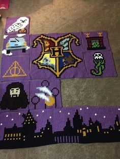 the harry potter rug is laying on the floor next to some other items that have been made out of legos