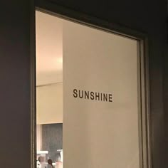 an open door with the words sunshine written on it