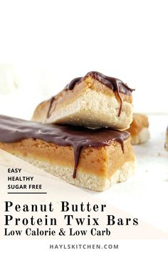 three peanut butter protein twix bars stacked on top of each other