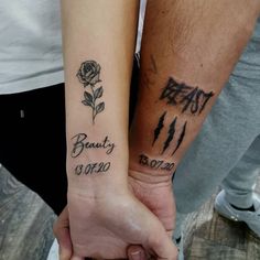 two people holding hands with tattoos on their arms that read beast and beauty before 08 / 01 / 20