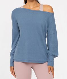 Elevate your style with a unique blend of sophistication and comfort. Crafted from soft brushed rib fabric, this long-sleeve top features pleated sleeves that gather into fitted cuffs, creating a full, voluminous silhouette. The off-the-shoulder design adds a hint of allure, while raw edge detailing gives it a modern, laid-back finish. 67% polyester 30% rayon 3% spandex Long Sleeve Tops With Ribbed Neckline For Spring, Versatile Long Sleeve Ribbed Top, Versatile Fall Tops With Ribbed Cuffs, Versatile Ribbed Top For Winter, Ribbed Tops With Relaxed Fit For Fall, Fall Ribbed Top With Relaxed Fit, Fall Ribbed Tops With Relaxed Fit, Fall Ribbed Relaxed Fit Tops, Versatile Stretch Ribbed Tops