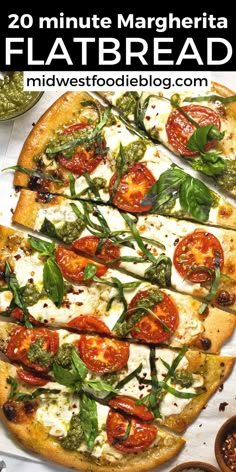 a pizza topped with tomatoes, basil and mozzarella