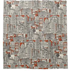 an orange and white wallpaper pattern with buildings on the top right hand corner in red