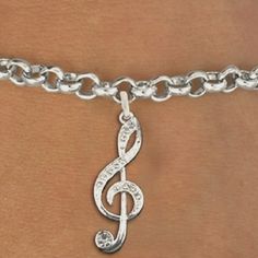 These Crystal Treble Clef Charm Bracelets Are Beautifully Handcrafted And Incredibly Detailed With Crystals That Will Make You See Stars. Comes With 7 1/2" Chain Bracelet And Lobster Clasp. Keep Just The Treble Clef Charm Alone Or Add To It To Give Yourself Some Personality! Brand New Handmade In England Rhodium Plated. Lead And Nickel Free 1 1/2 " H X 1/2" W Tags: Music Gift, Music Accessory, Music Themed, Music Jewelry, Silver, Clef, Treble Clef, Charm, Bracelet, Crystals Emo Accessories, Eye Drawing Tutorials, Musical Jewelry, Music Jewelry, Music Accessories, Gold Charm Bracelet, Treble Clef, Music Themed, Music Gifts