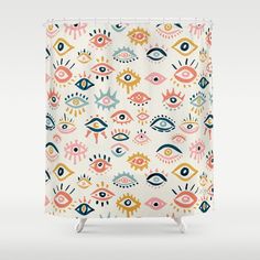 a shower curtain with an eye pattern on it