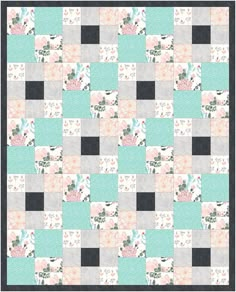 a patchwork quilt with flowers and leaves in pastel blue, grey, pink, black and white colors