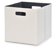 a white storage box with black handles