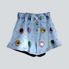 Embrace the spirit of Y2K trend with our 2023 Summer Collection loose embellished rhinestone denim shorts! From their high-waisted silhouette to the buttons and rubber closure. this piece is a fashionista's dream come true. Crafted with luxurious denim and glimmering rhinestones. these shorts will make a lasting impression on your wardrobe and your memories.Why These Shorts are a Must-HaveThese vintage-inspired shorts will take you back to the golden age of fashion. with all the modern touches t Spring Bottoms With Rhinestones, Short Style, Short Spring Bottoms With Rhinestones, Casual Embellished Shorts For Spring, Rhinestone Shorts For Spring, Rhinestone Embellished Shorts For Spring, Rhinestone-embellished Short Bottoms For Spring, Denim Bottoms With Rhinestones Short Length, Denim Bottoms With Rhinestones, Short Length, Spring Jean Shorts With Rhinestones