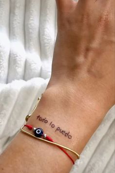 a woman's arm with a tattoo on it that says, totoo to puedo