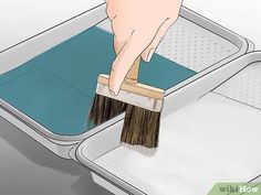 a person is cleaning the inside of an oven with a dustpan and brush in it