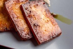 two pieces of cake sitting on top of a white plate