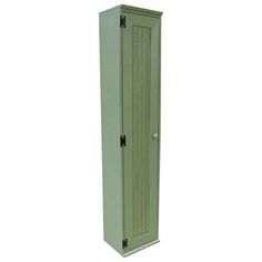 a tall green cabinet sitting on top of a white floor