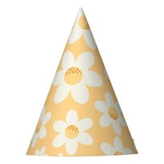 a party hat with daisies on it