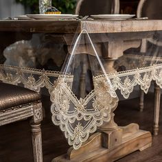 an image of a table with lace on it