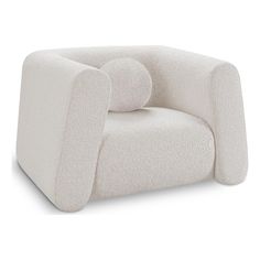 an upholstered chair with two pillows on the back and armrests, in white