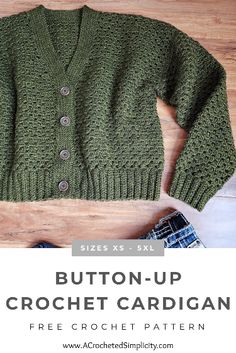 the button up crochet cardigan pattern is shown on top of a wooden table