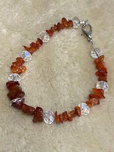 Handmade crystal chip bracelet ,made with carnelian and crystal faceted beds  and a regular lobster claw . Chip Bead Jewelry, Crystal Chip Bracelet, Chip Bracelet, Chip Beads, Stone Crystal, Bead Jewelry, Lobster Claw, Handmade Natural, Natural Stone