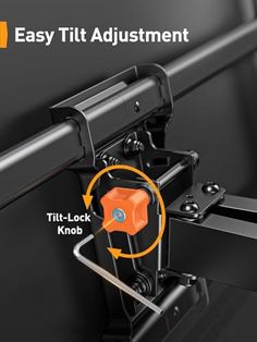 the easy tilt adjust mechanism is shown with an orange button on it's left side