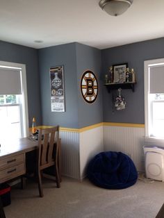 the room is clean and ready to be used as a playroom for hockey fans