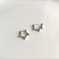 Made with 925 sterling silver Measures 3/4 Inch Comes with the gold plating of your choice, Yellow or White Gold Hand finished by artisans Gift box included Star Hoop Earring, Star Earrings Hoop, Cute Small Earrings Studs, Cute Earrings Studs, Star Things, Star Earrings Silver, Star Hoop Earrings, Earrings Star, White Accessories