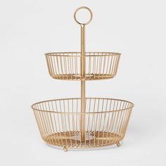 three tiered gold metal basket holder