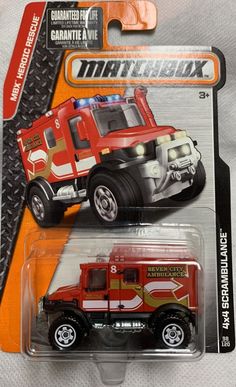 a red and yellow truck with lights on it's head is in the package