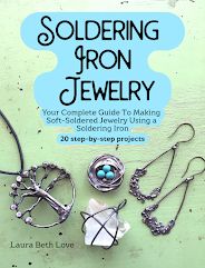 the book cover for soldering iron jewelry by lauren beth love, featuring several different pieces