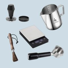 various kitchen gadgets are arranged on a blue background, including an electric tea kettle