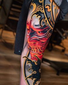 a person with a tattoo on their leg