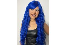 - Lace Part Wig - Color: ELECTRIC BLUE - Features Bangs/Fringe - Extra Long & Wavy - Beach Waves - Center Part - 100% Synthetic Fiber - Heat Resistant - 350 ºF ** Actual product color may vary from the images shown. Every monitor or mobile display has a different capability to display colors, and every individual may see these colors differently. In addition, lighting conditions at the time the photo was taken can also affect an image's color. Also, wigs/ponytails are sold AS IS and are not made to be restyled from the original state. Hair pieces that can take heat will state otherwise.**  FINAL SALE - No returns or exchanges policy. Please look at all photos and video before placing an order. If you have any questions or concerns please contact me.  * Blue Cosplay Wig * Blue Fairy Wig * B Blue Wig, Halloween Wigs, King Fashion, Blue Fairy, Synthetic Fiber, Cosplay Wigs, Beach Waves, Electric Blue, Blue Lace