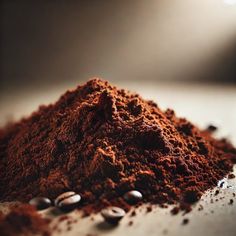 a pile of coffee grounds on top of a table