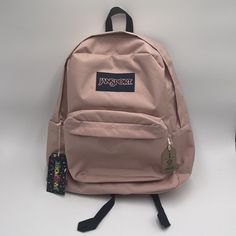 This Jansport Superbreak Backpack In Misty Rose Is The Perfect School Bag For Any Unisex Kid. With A Large Size And Multiple Pockets, It's Great For Travel, Activewear, And Casual Use. The Backpack Features A Zip Closure, Strap Accents, And A Zippered Water Bottle Pocket. Made Of 100% Polyester, It's Both Durable And Stylish. The Solid Pattern And Pink Color Make It A Great Addition To Any Outfit. Behind Every Strong Person, Rosé School, Cute Backpacks For School, Jansport Superbreak Backpack, Strong Person, Aesthetic Backpack, Misty Rose, Cute Backpacks, Jansport Backpack