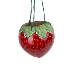 a hanging ornament shaped like a strawberry