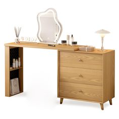 a wooden desk with drawers and a mirror on it's shelf next to a lamp