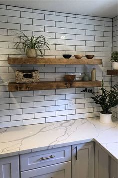 the kitchen counter is clean and ready to be used as a shelf for pots, pans, and other items