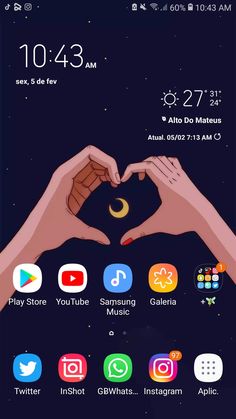 two hands making a heart shape with the moon in the sky above them and other icons below