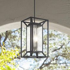 an outdoor light hanging from the ceiling