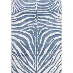 a blue and white rug with zebra print