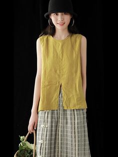 Sku CY-!25830 Material Linen Style Loose , Sleeveless Feature Split-front Occasion Going out , Casual , Vintage Seasons Summer Type T-Shirts Tops Color YELLOW,BLACK,WHITE,PURPLE Size FREE SIZE Size chart: Please consult the size chart we provide for this item's measurements to help you decide which size to buy. Please note: There may be 1-3cm differ due to manual measurement. CMINCH Cm Bust Shoulder Length FREE SIZE 108 38 59-69 Sleeveless Solid Color T-shirt For Spring, Yellow Sleeveless Cotton T-shirt, Yellow Cotton Vest Top, Casual Yellow Tank Vest, Yellow Sleeveless Cotton Tops, Green Crew Neck Vest For Summer, Yellow Sleeveless Vest Top, Boho Style Dresses, Sleeveless T Shirt