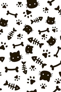 a black and white cat pattern with bones, fish, and bones on the ground