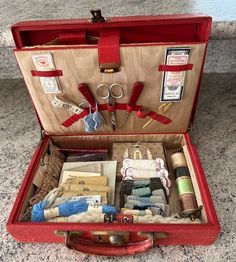 an open suitcase filled with lots of different items