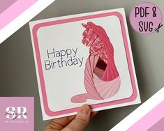 a hand holding up a card that says happy birthday with an image of a pink shoe