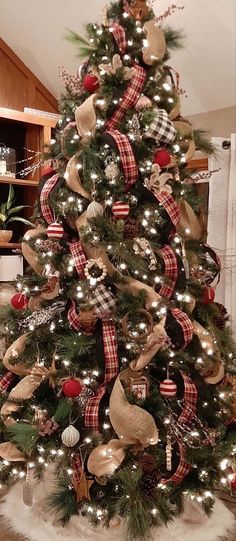 a decorated christmas tree in a living room