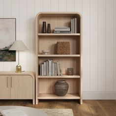 a wooden book shelf with books on it