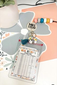 a keychain that is attached to a clipboard with the words miss step on it