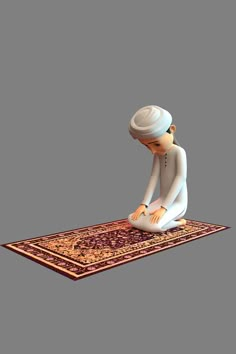 a person sitting on top of a rug