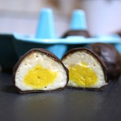 two pieces of chocolate with an egg in the middle