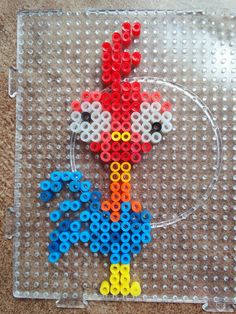 an image of a beaded animal made out of legos on a plastic tray