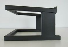 a black square object sitting on top of a table